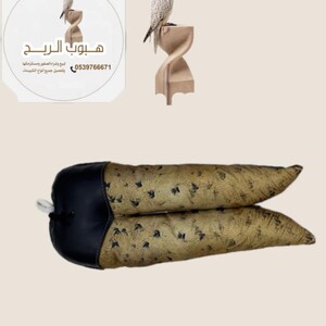 ملواح شكل حبارى دمية